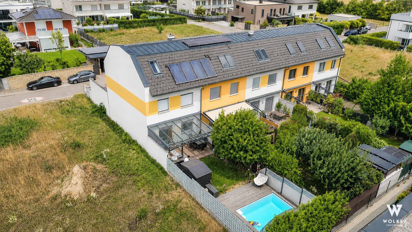 Living at the highest level – Stylish corner terraced house on 4 floors with pool, sauna and private garden I 2 car parking spaces