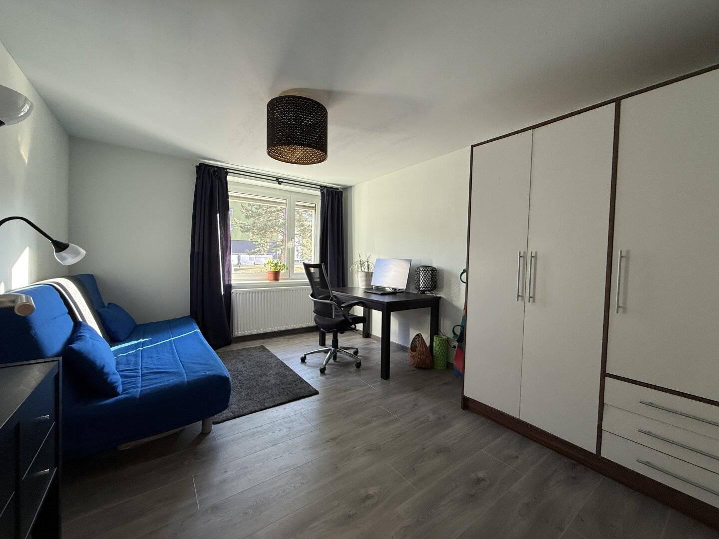 Lovingly renovated 3-room ground floor apartment with charm