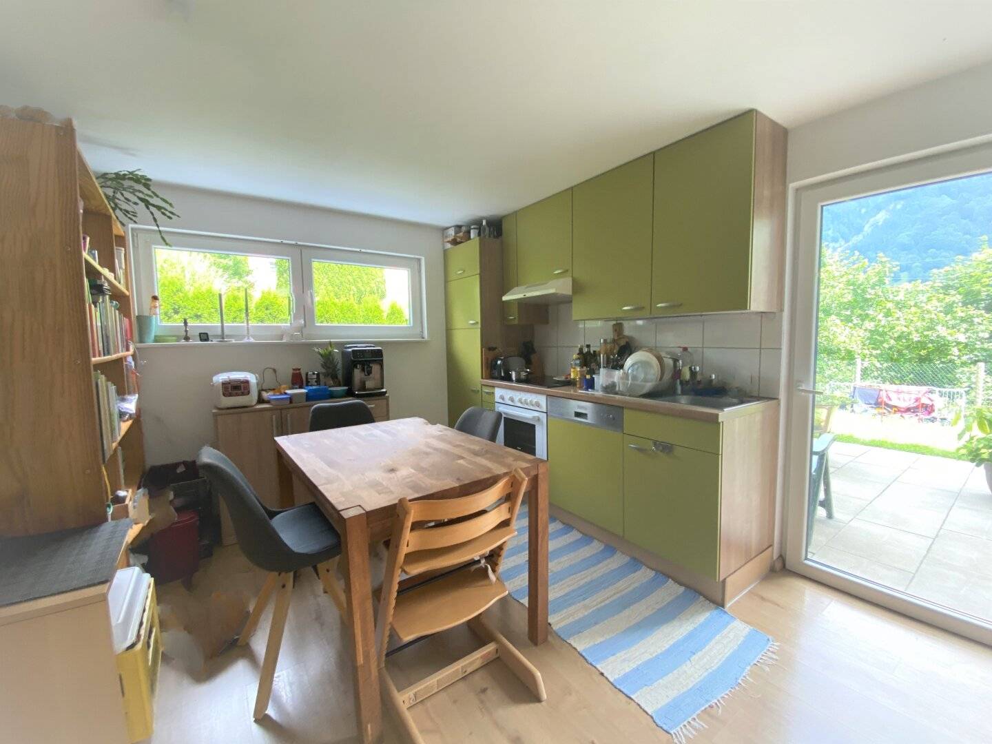 Cozy 2-room garden apartment with car parking space