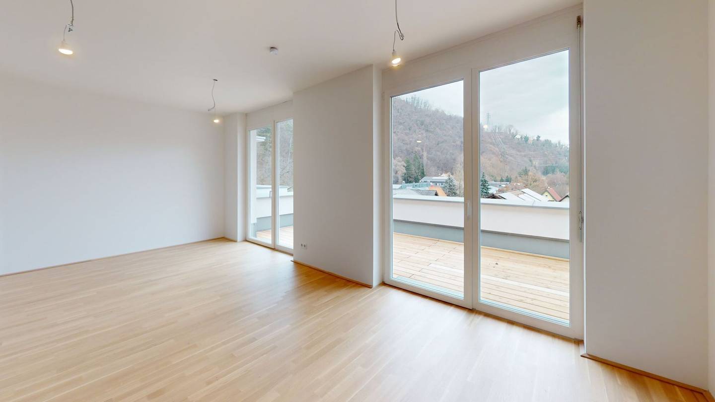 Dachgeschosswohnung with balcony and garage included