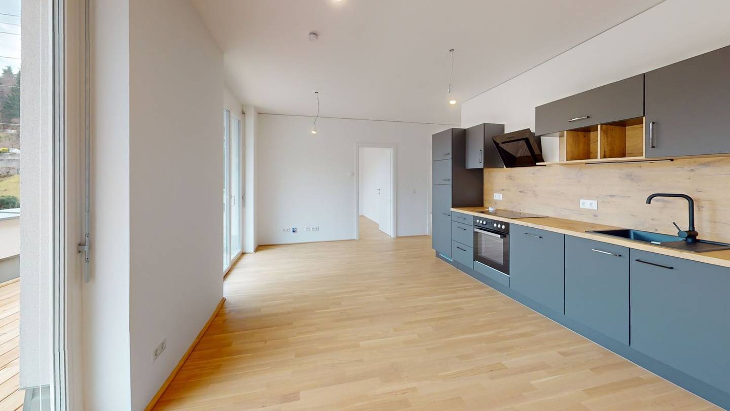 Dachgeschosswohnung with balcony and garage included