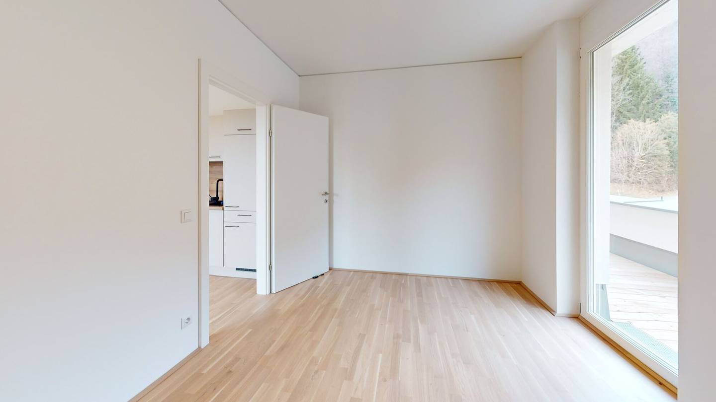 Top floor apartment new build with balcony and garage