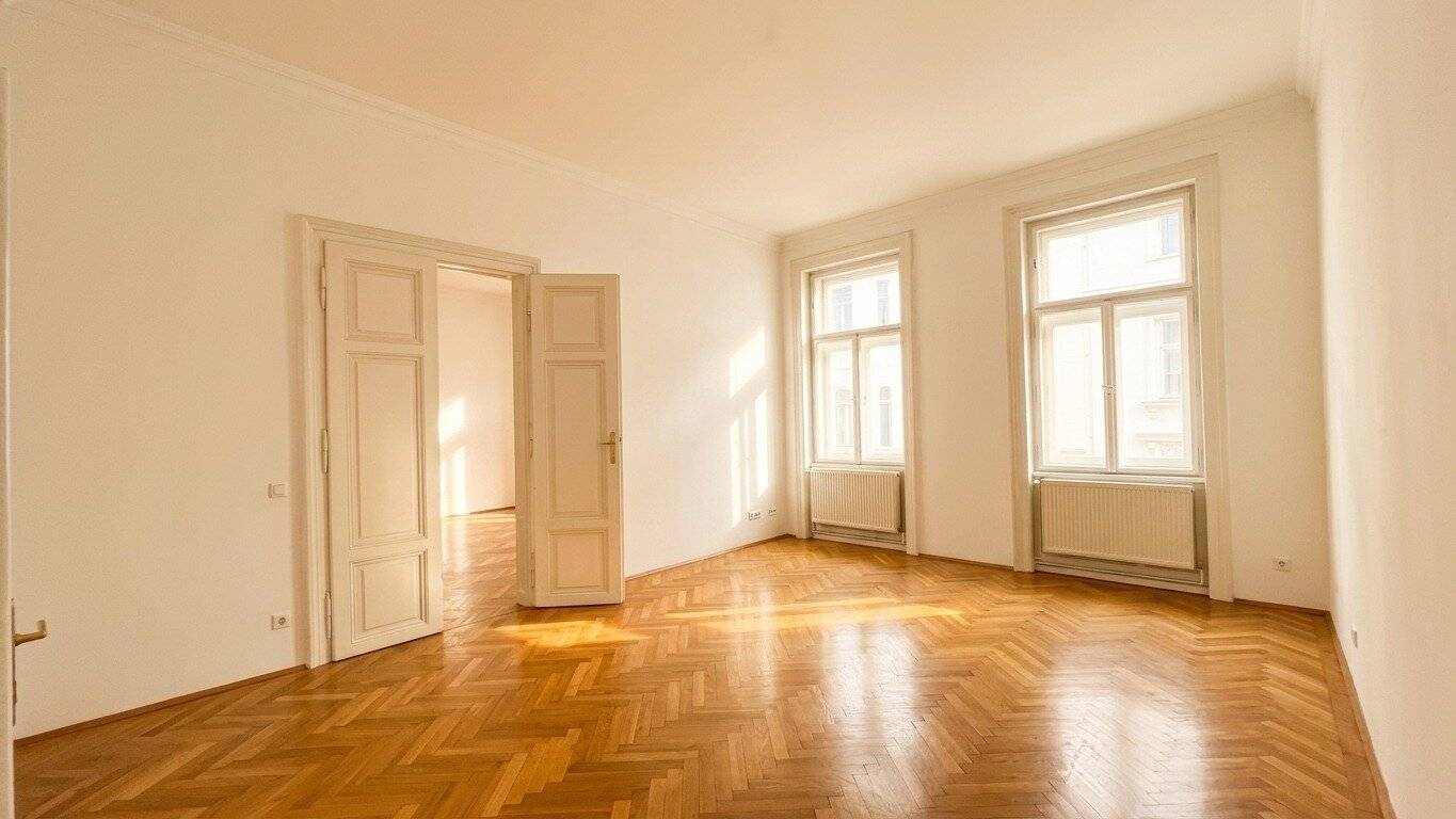 Spacious Viennese historic apartment with approx. 4.20 m high ceilings, balcony and direct elevator access
