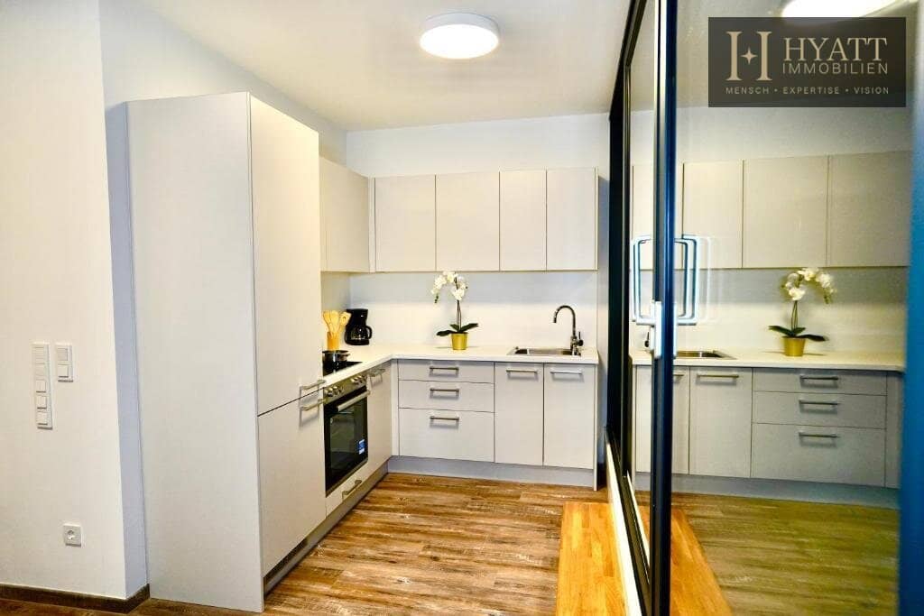 Exclusive two-level attic maisonette | approx. 87 m² living space and spacious terrace | fully furnished | Owner-occupancy or short-term rental | approx. 6% gross revenue yield 2025