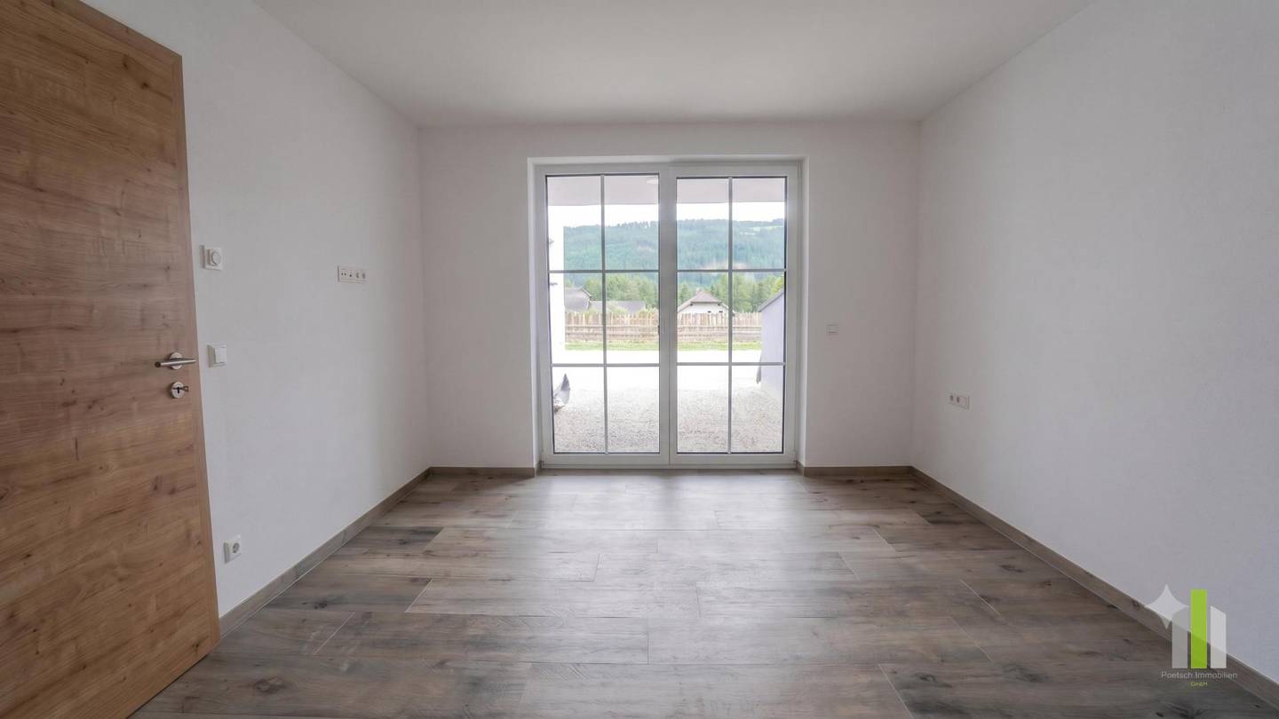 Bright Neubauwohnung with large terrace and carport