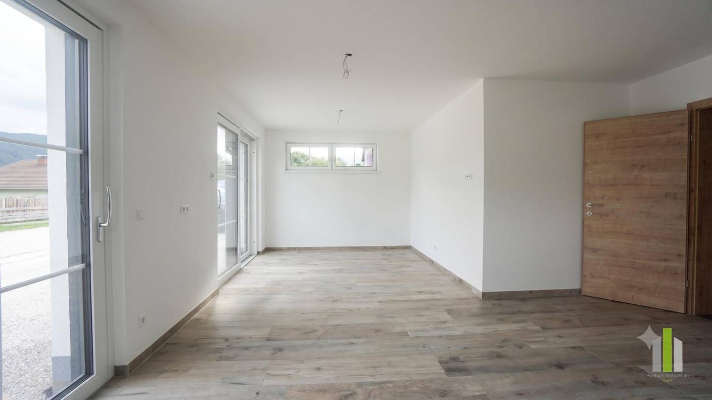 Bright Neubauwohnung with large terrace and carport