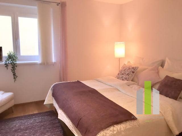 Fully furnished apartment with underground parking and balcony in a quiet location