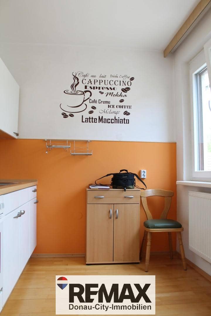 Lichtdurchflutete Erdgeschosswohnung mit separater Küche