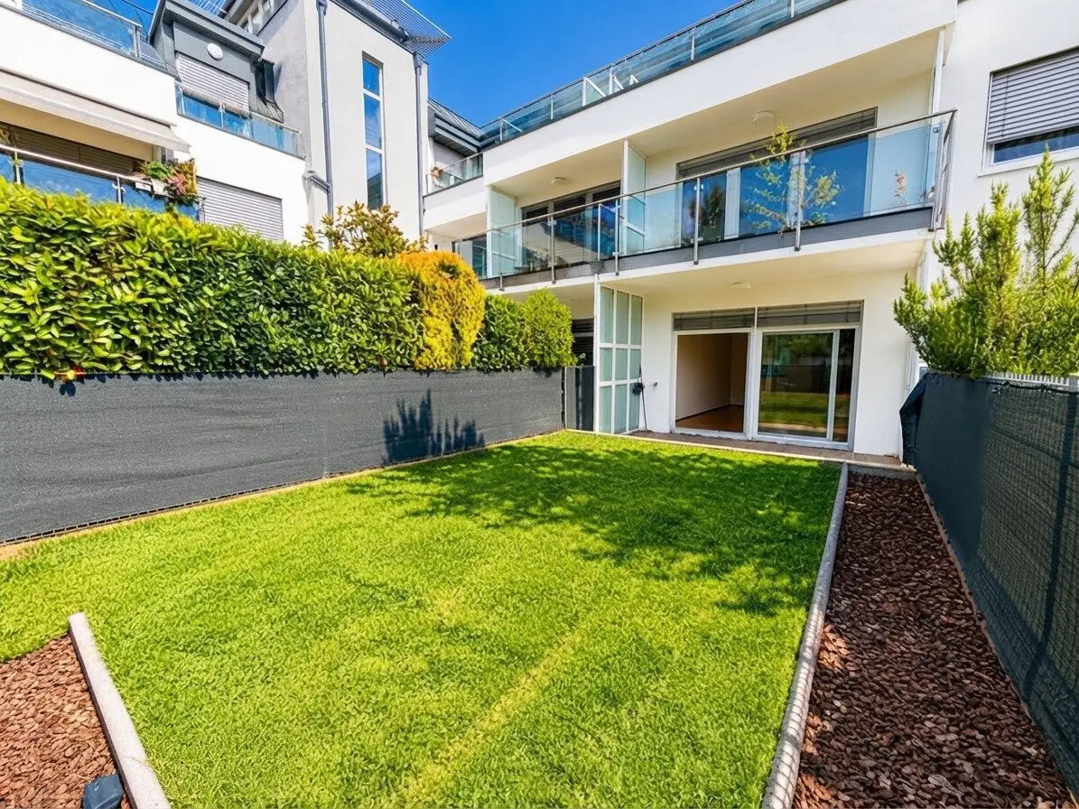 Living like in a house Exclusive 3-room maisonette with private garden, terrace, balcony and garage, approx. 142 m² usable floor area