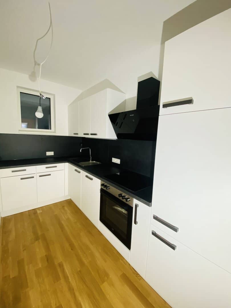 Commission-free new build apartment with 2 rooms, balcony and underground parking space