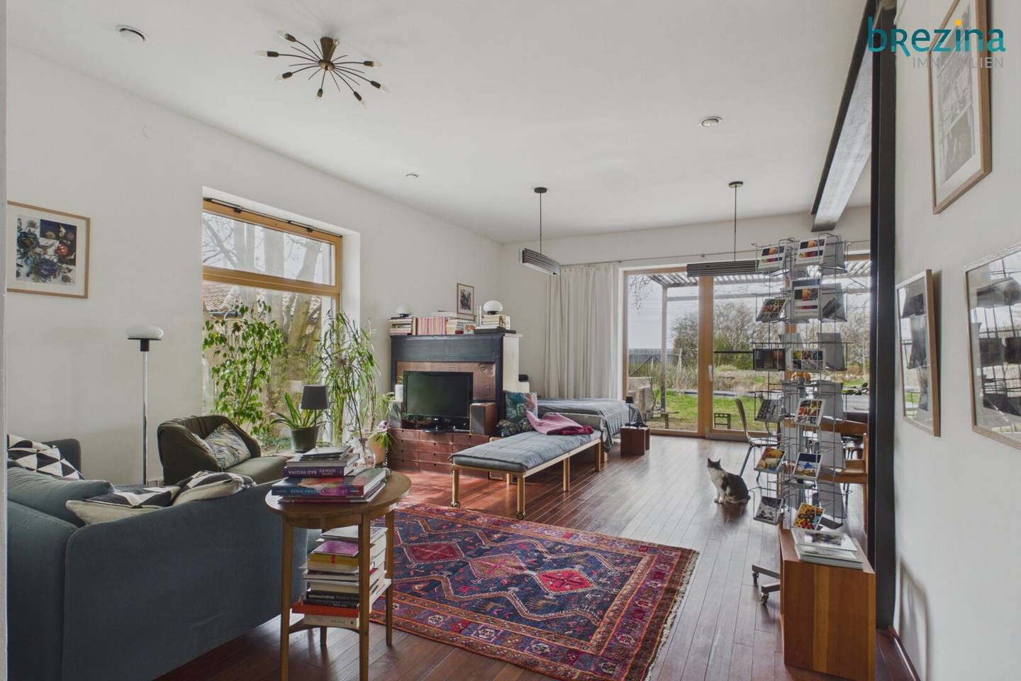 an ideally designed two-family house in immediate proximity to S7 - 2125 Neubau-Kreuzstetten near Wolkersdorf, accessible, biologically managed garden with a spacious swimming biotope