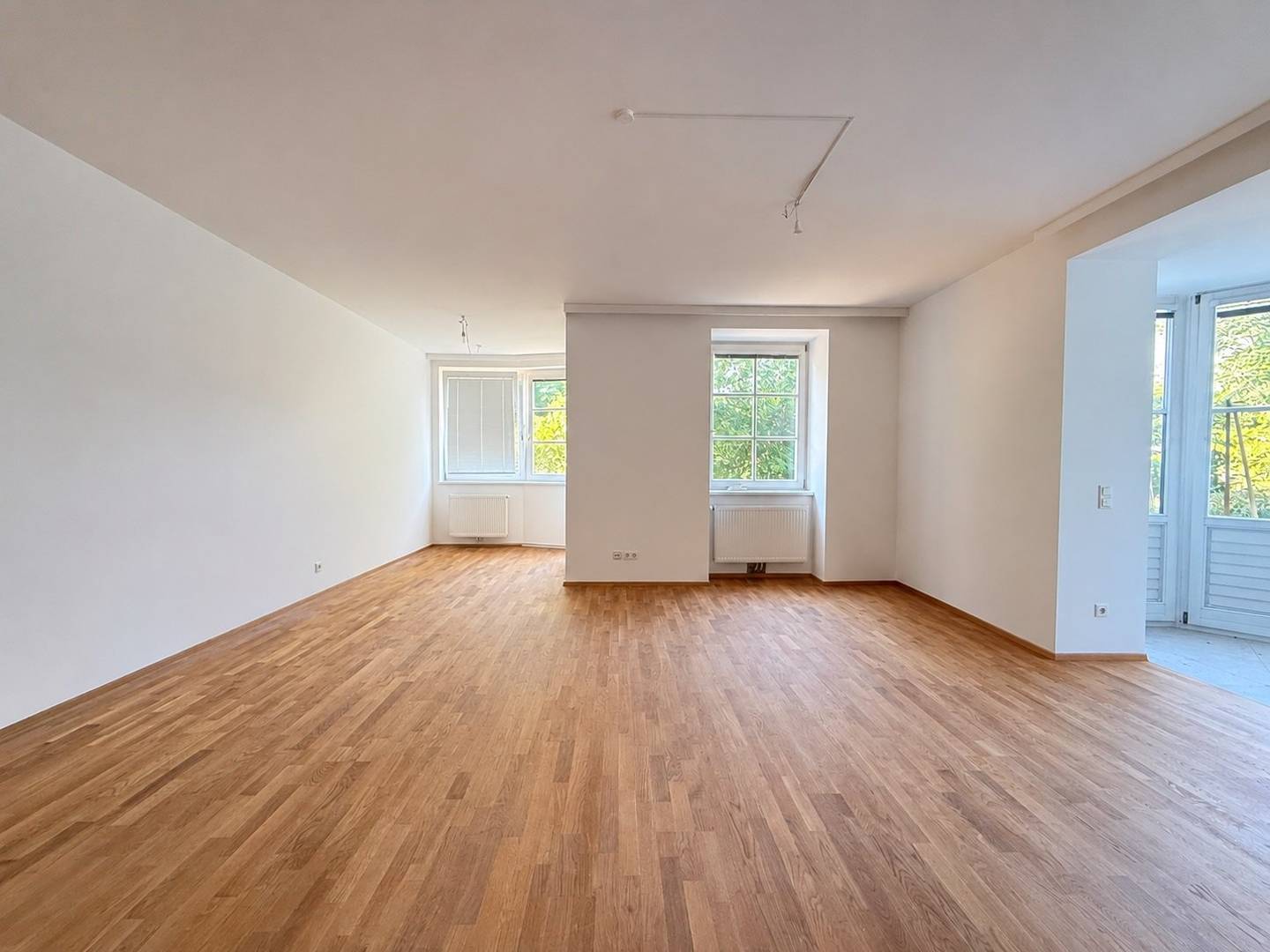 Erdgeschosswohnung mit großem Eigengarten und Garagenplatz