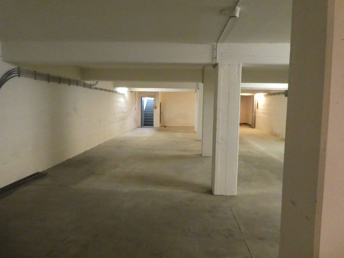 Central location unheated storage area in the basement with pallet lift