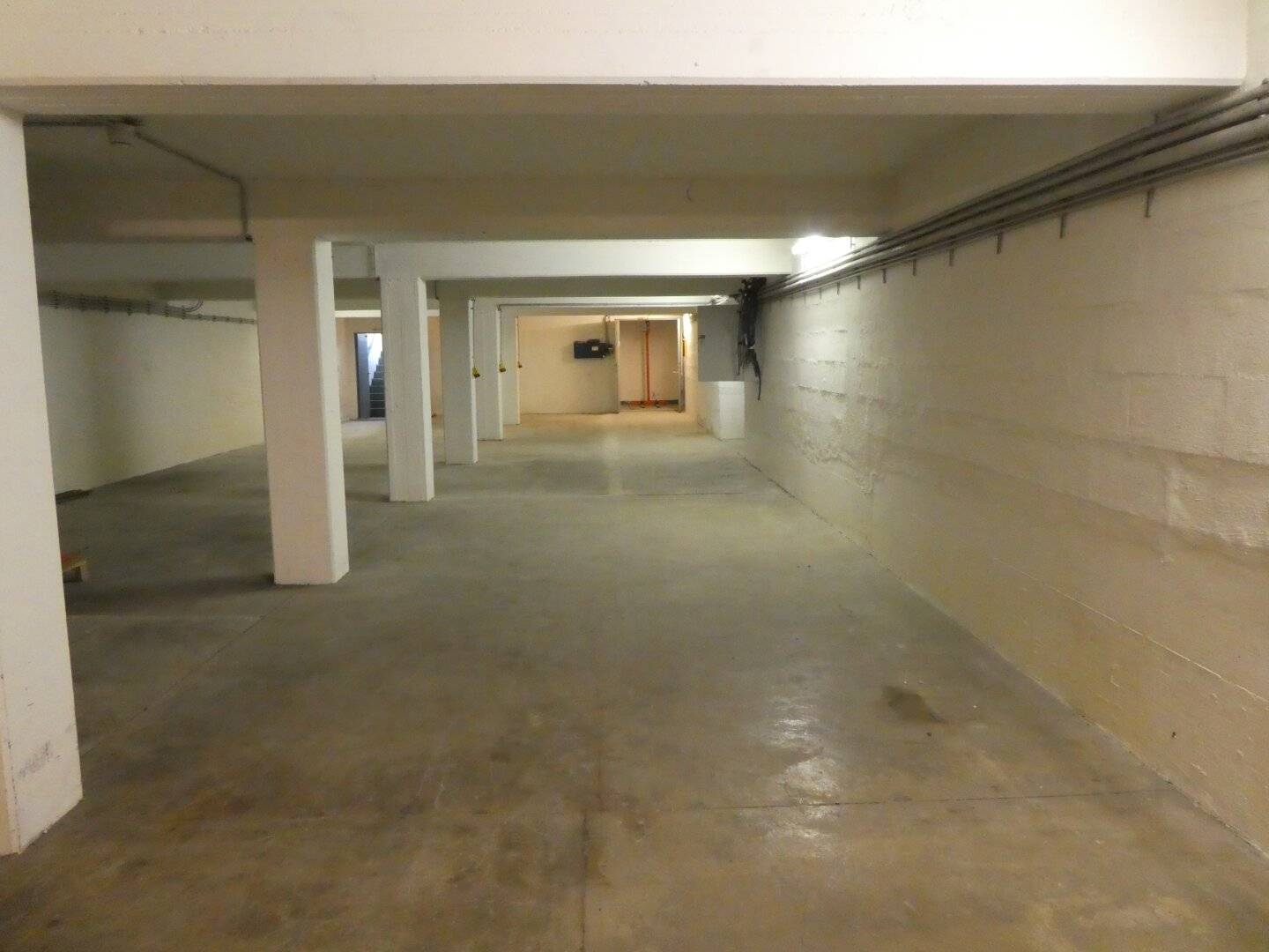 Central location unheated storage area in the basement with pallet lift