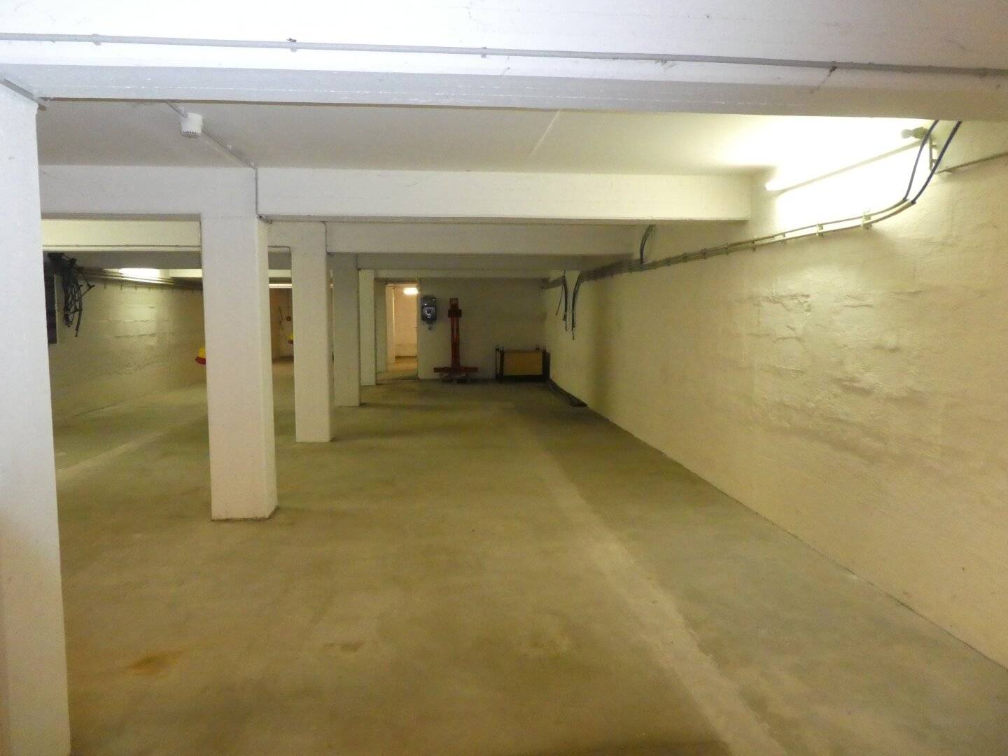 Central location unheated storage area in the basement with pallet lift
