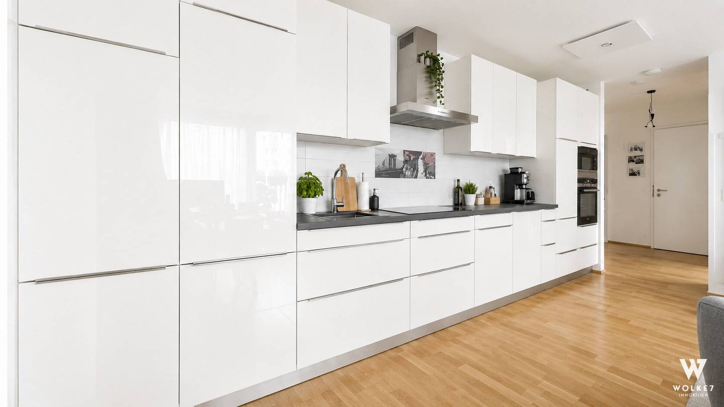 2-Zimmer-Dachgeschoßwohnung mit ca. 9 m² Dachterrasse I Klimaanlage I Nahe U1 Kagraner Platz