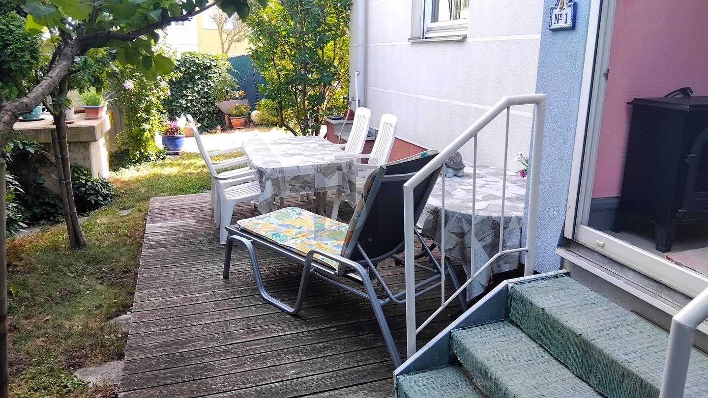 Erdgeschosswohnung mit privatem Garten und Loggia
