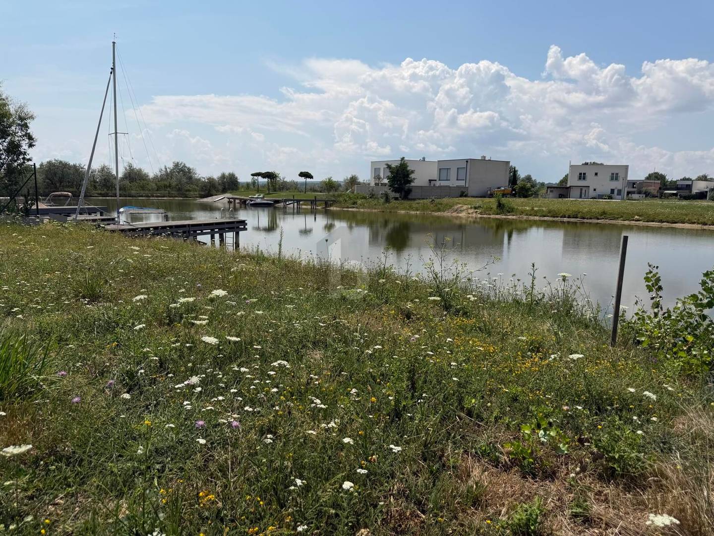 Wohnung mit privatem Seezugang und Wasserblick