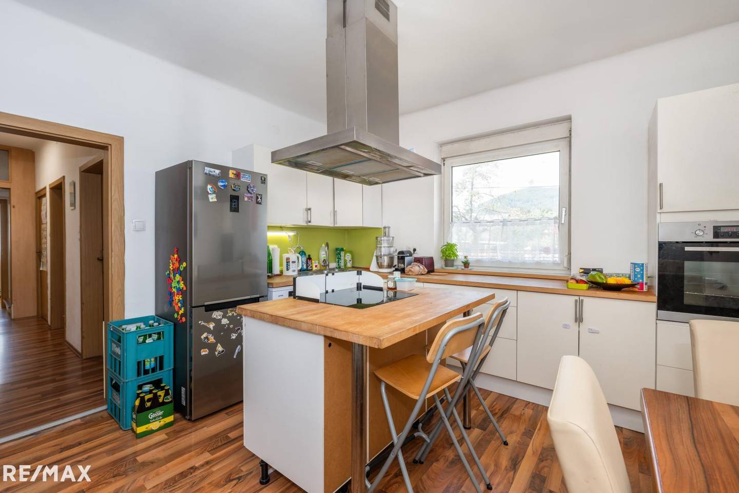 Sonnige Wohnung mit großem Garten und Garage