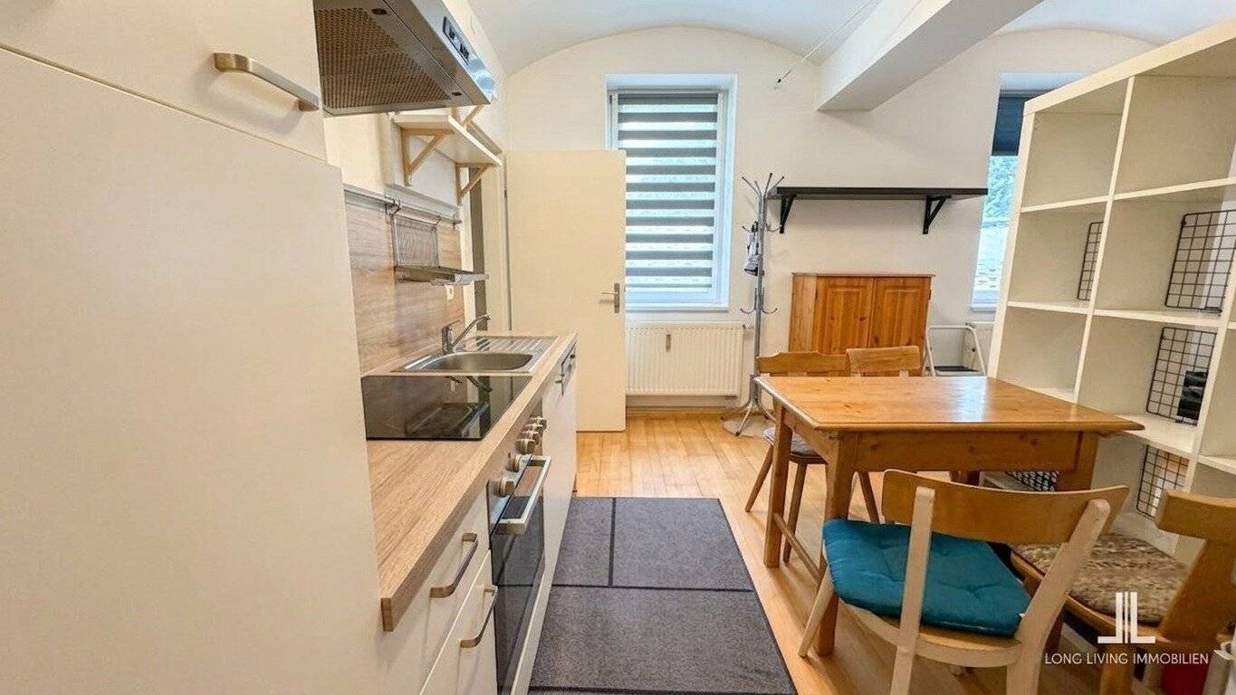 Bright lower ground floor apartment with large garden windows and old building charm_Top 1