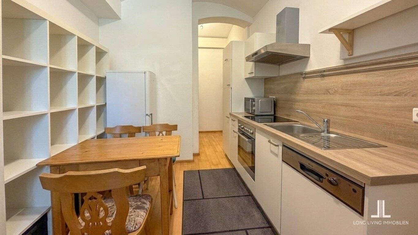 Bright lower ground floor apartment with large garden windows and old building charm_Top 1