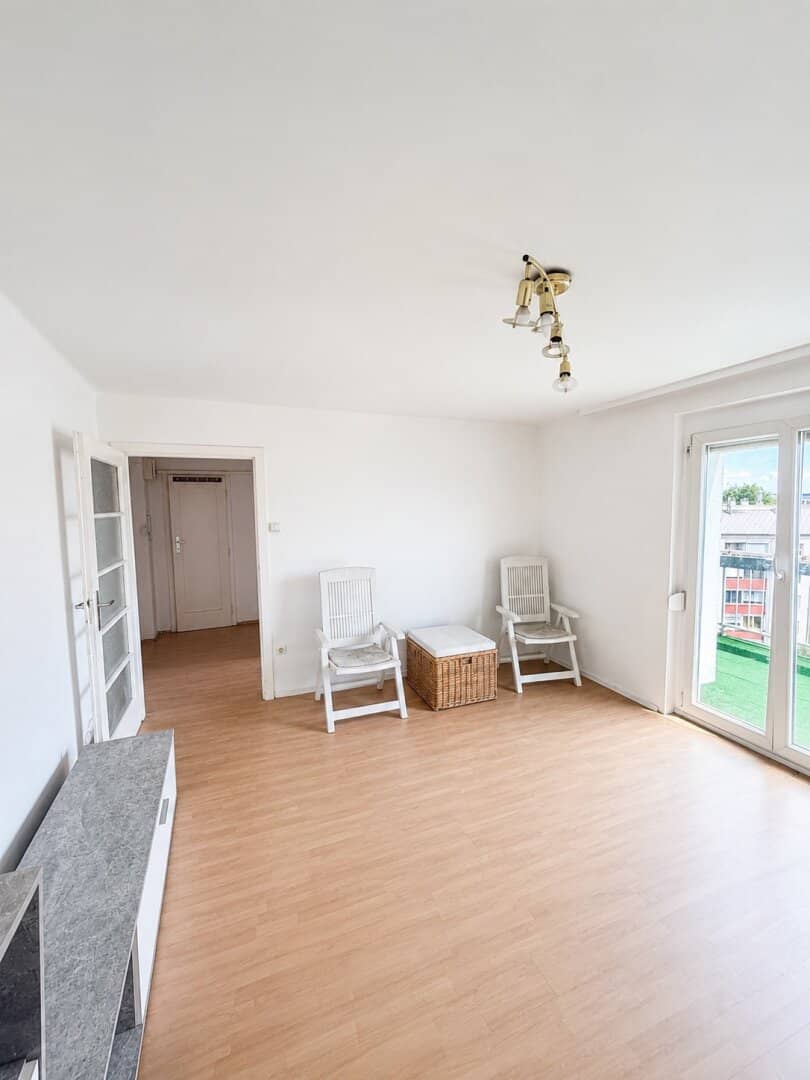 Attic apartment in need of renovation with spacious terrace and distant view