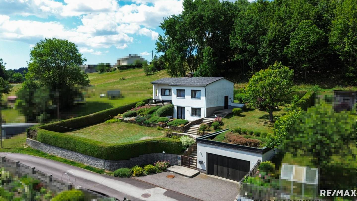 Naturnahe Wohnung mit großem Garten und Garage