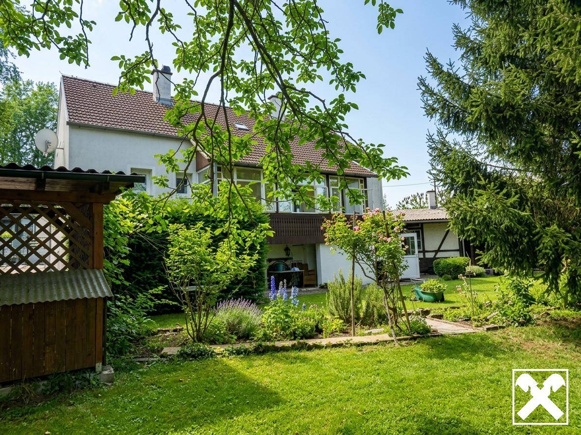 Modernized family apartment with small garden