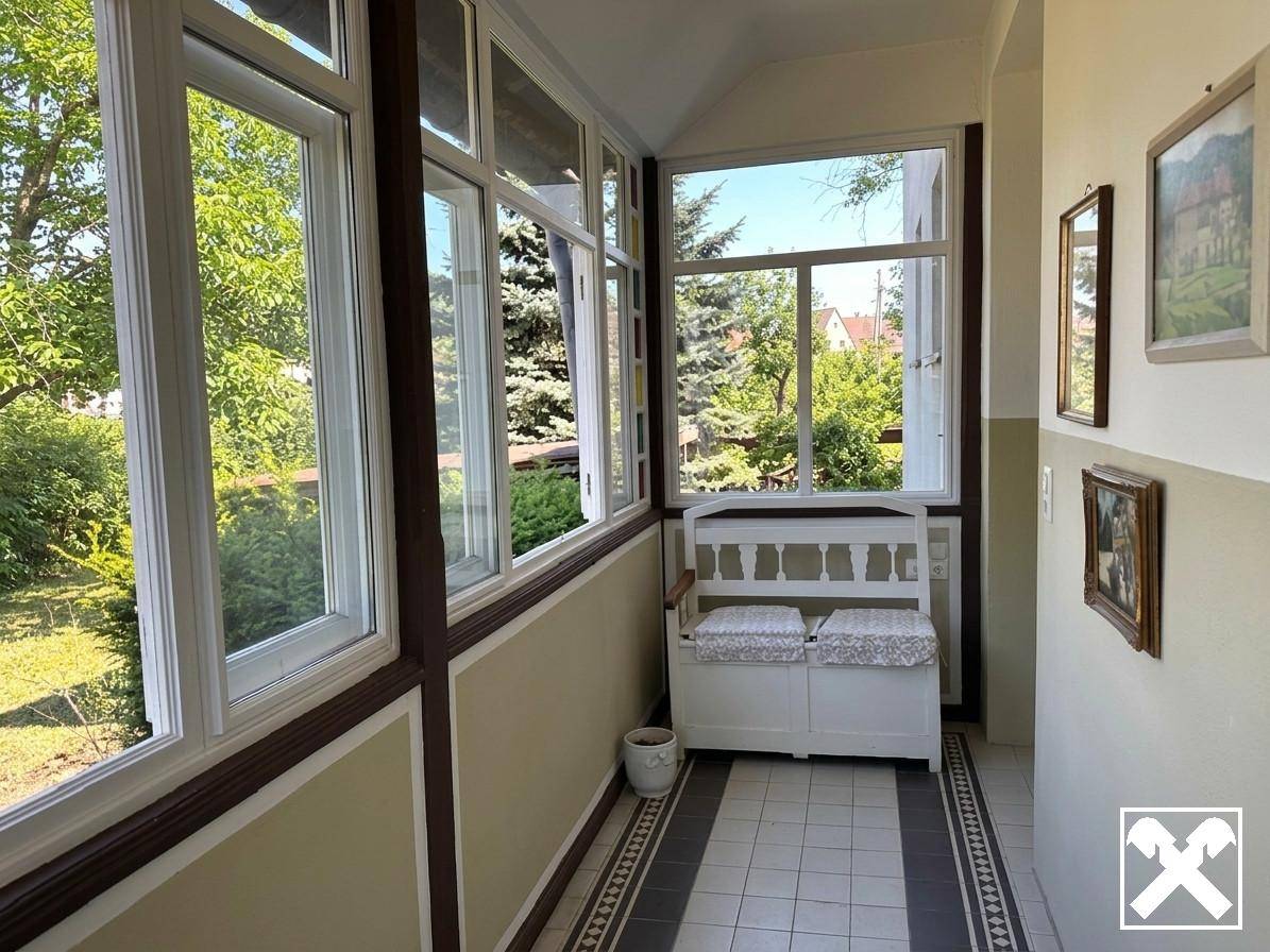 Modernized family apartment with small garden