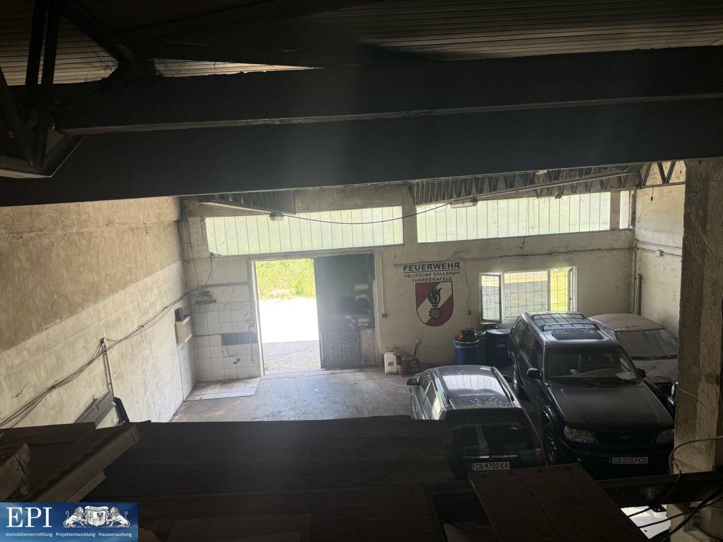 Spacious commercial hall with storage area and parking spaces