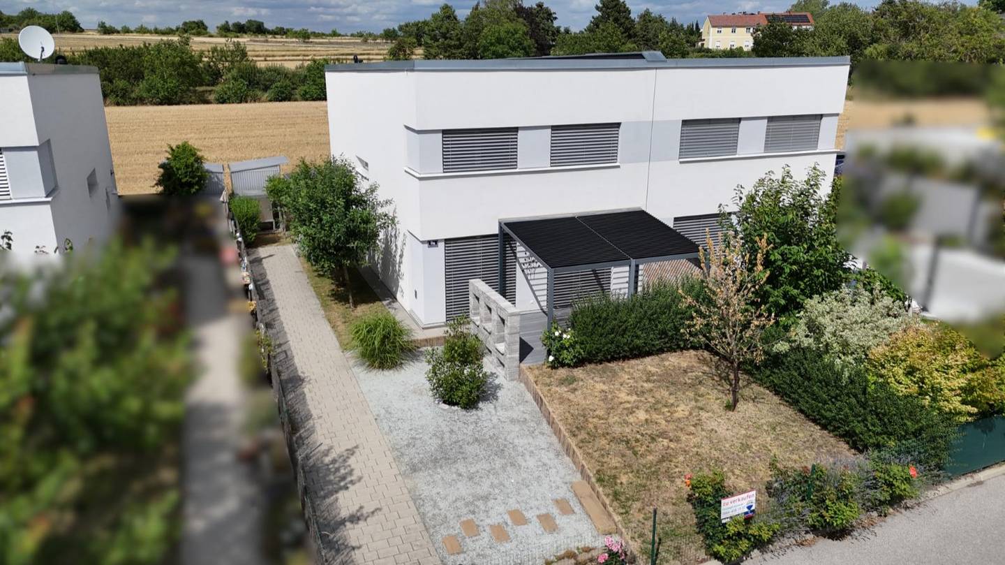 Passivhaus mit überdachter Terrasse in ruhiger Lage Familienwohnung