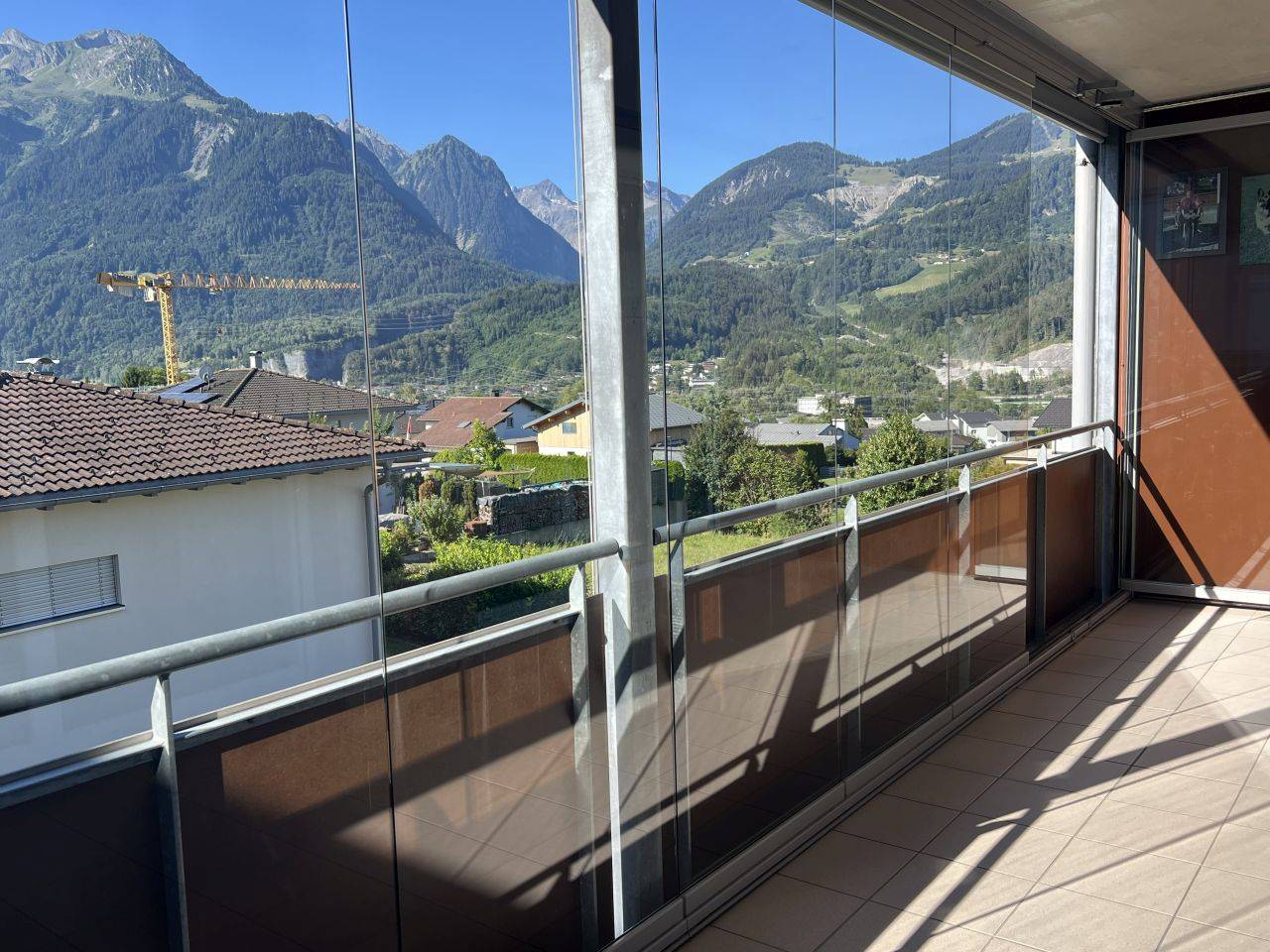 Dachgeschosswohnung with glazed terrace and mountain view