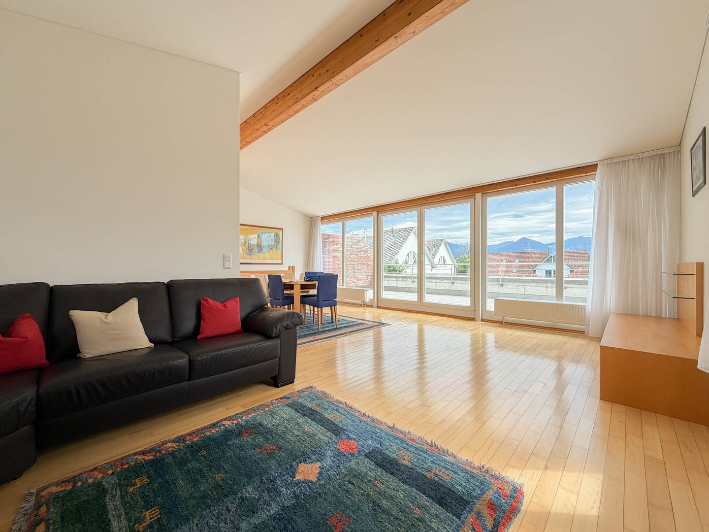 Light filled maisonette apartment with south terrace and carport