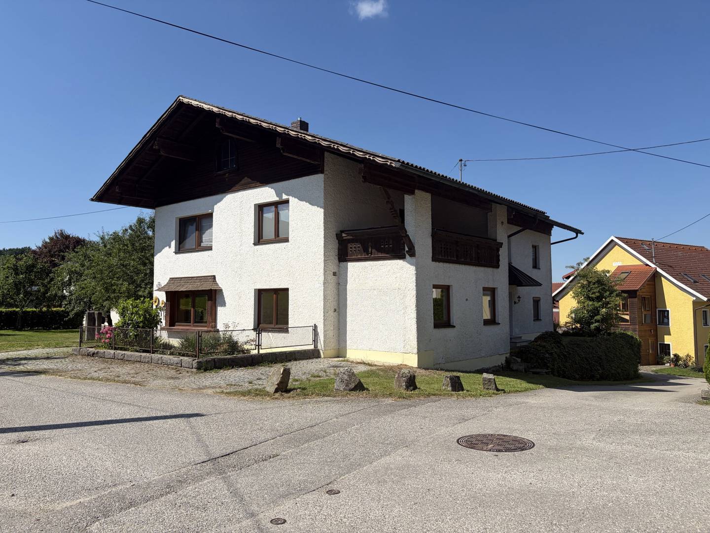 Wohnung mit vermietbarer Werkstatt und Garten