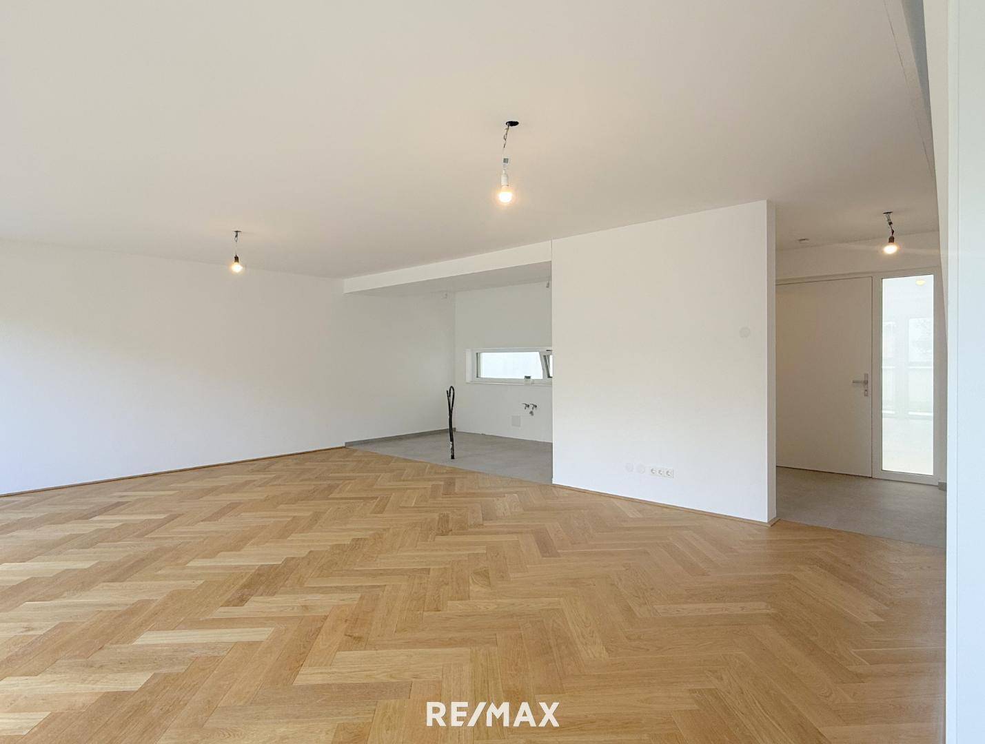 Lichtdurchflutete Familienwohnung mit Dachterrasse und Garten