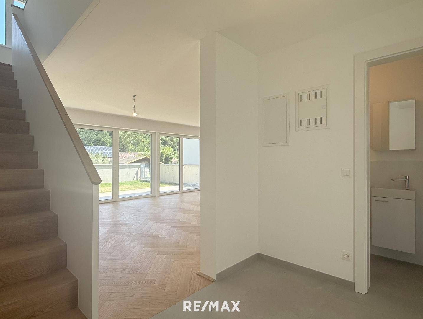 Lichtdurchflutete Familienwohnung mit Dachterrasse und Garten