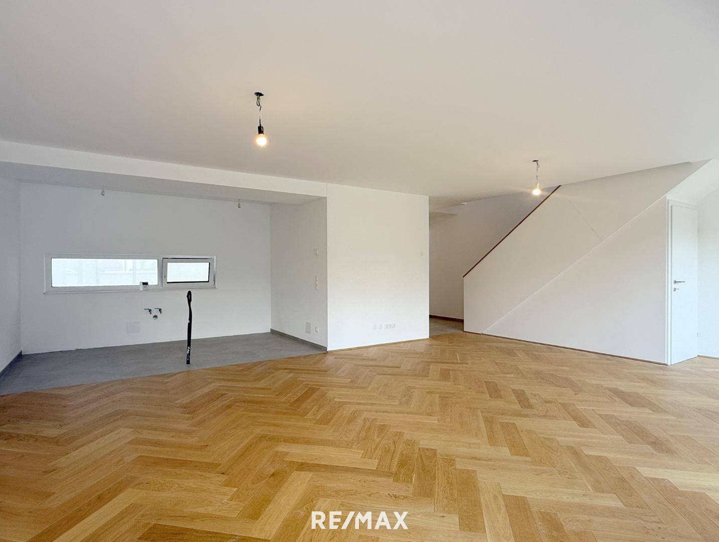Lichtdurchflutete Familienwohnung mit Dachterrasse und Garten