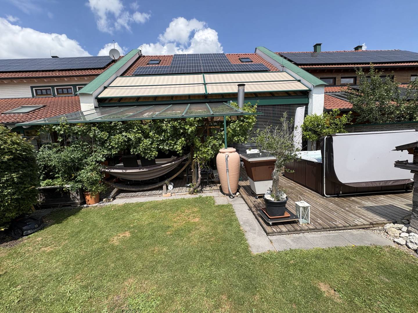 Family apartment energy efficient with PV system and maintained garden