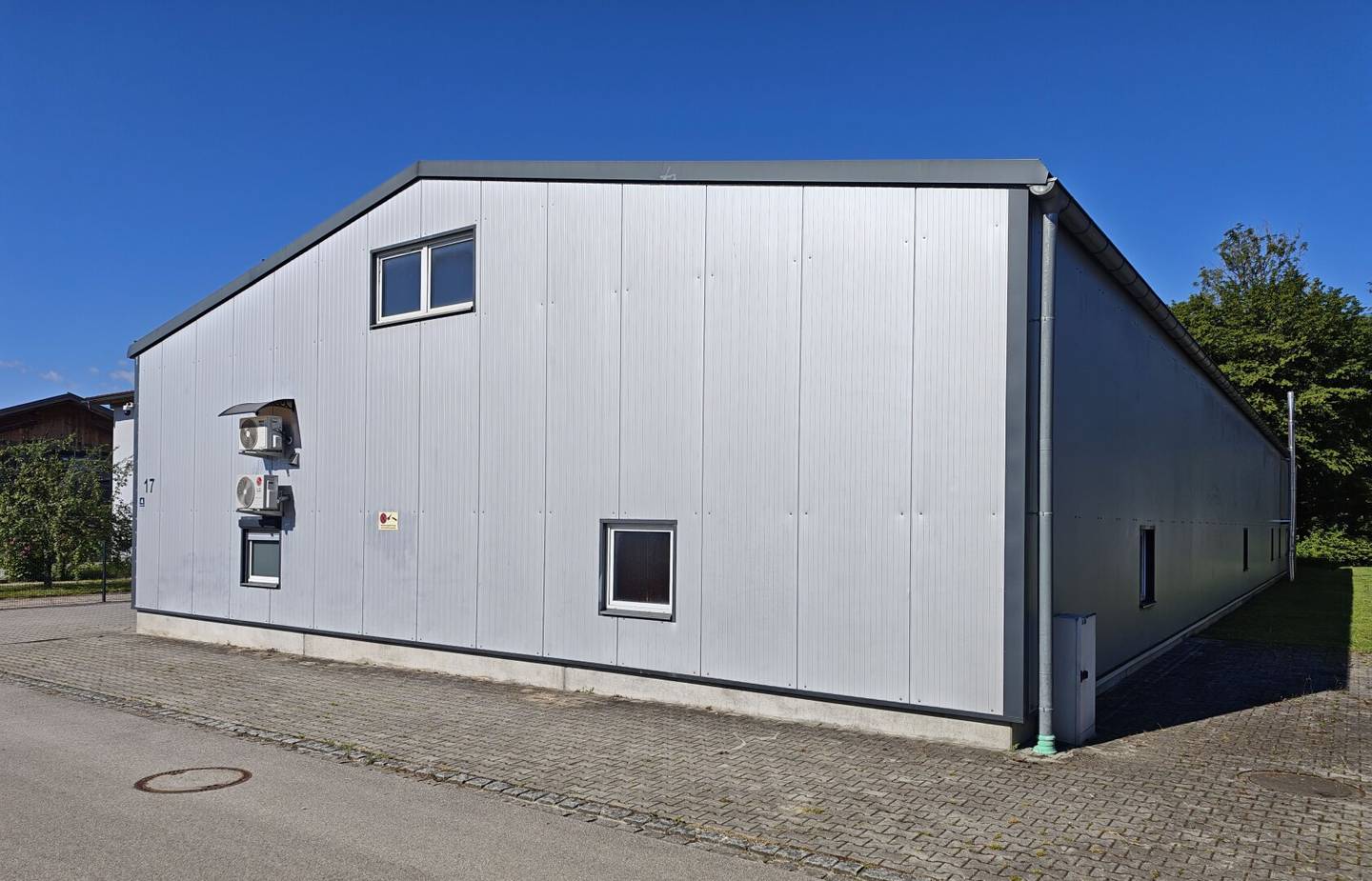 Well located commercial property with modern commercial hall and manager's house with 2 semi-detached houses