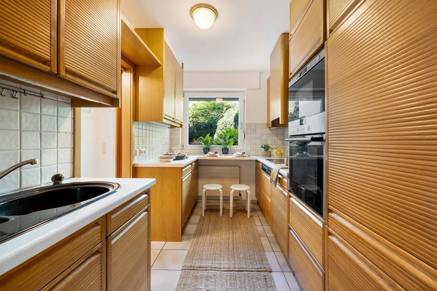 Charming terraced house in an absolute green quiet location with garage