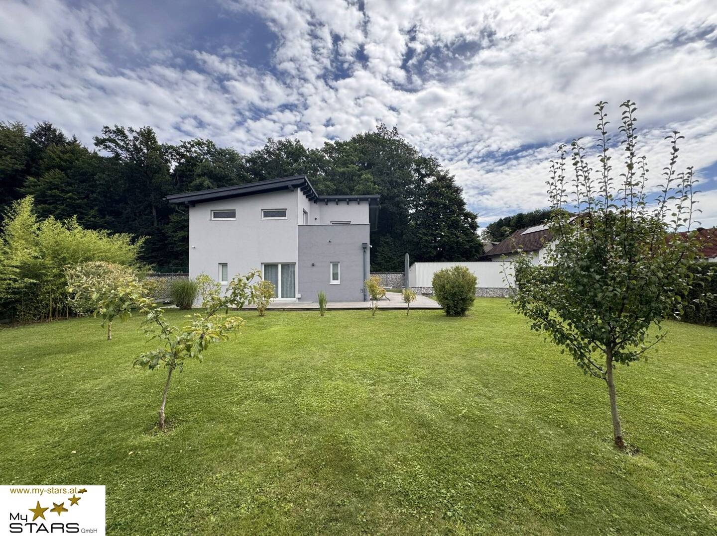 Well-maintained house in Palting near Mattsee with garden, roof terrace and carport