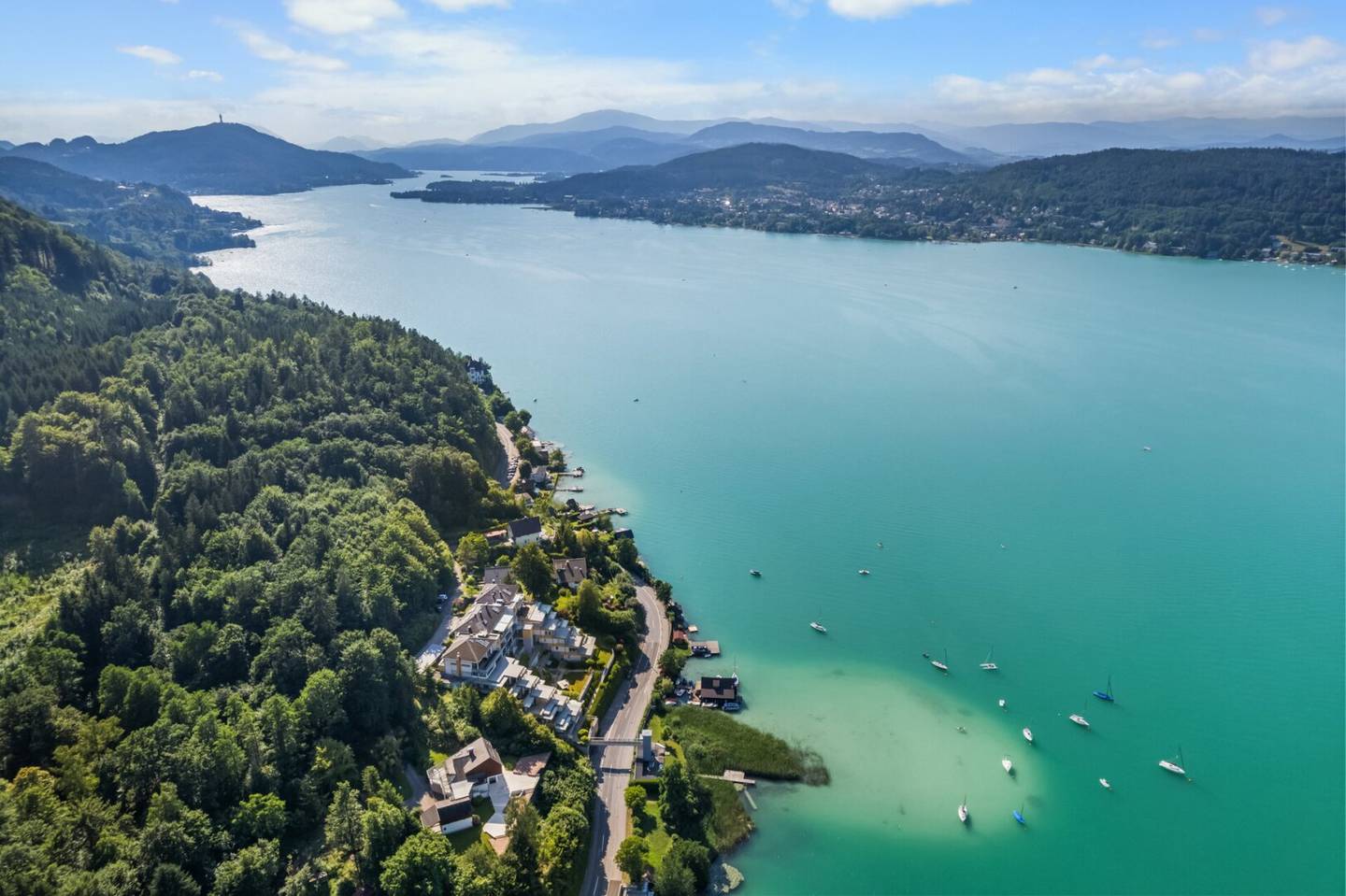 Luxury apartment directly on Lake Wörthersee with private bathing jetty &amp; large panoramic terrace