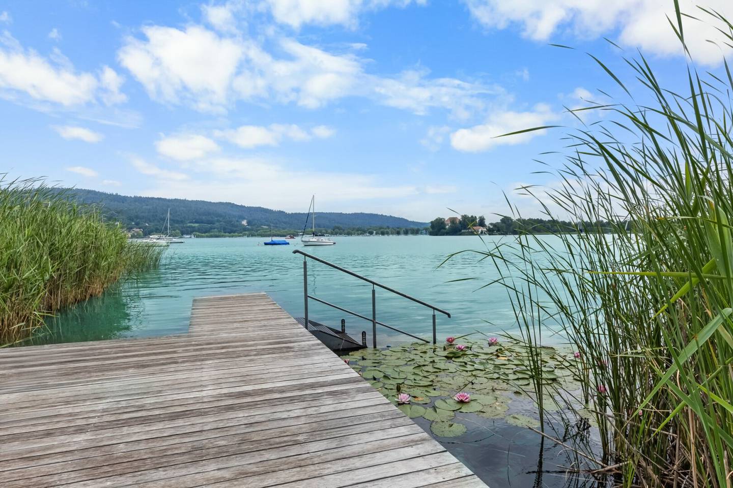 Luxury apartment directly on Lake Wörthersee with private bathing jetty &amp; large panoramic terrace