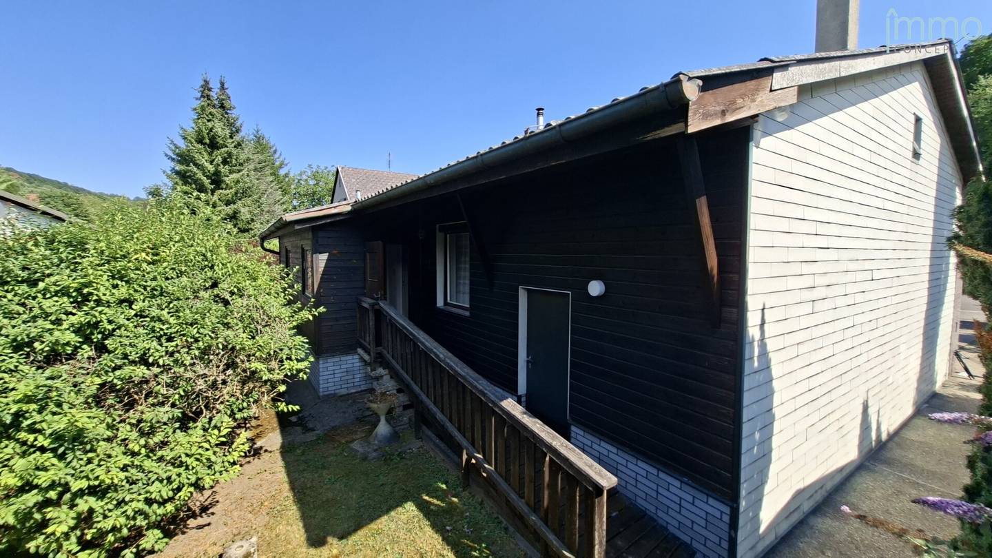 individually expandable 3-room Vienna Woods bungalow in level sunny location