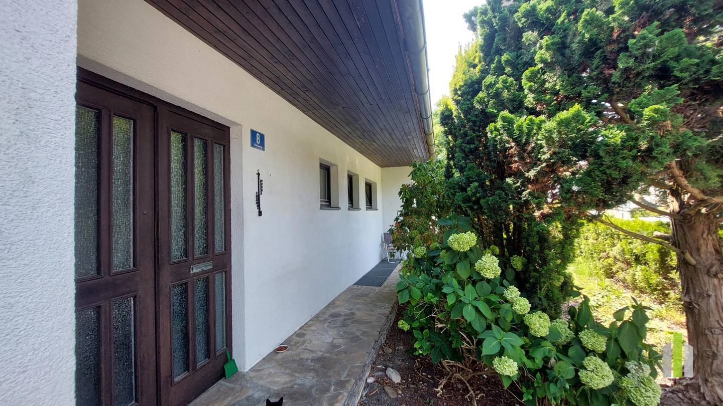 Sonnige Hanglage mit Terrassengarten Familienwohnung