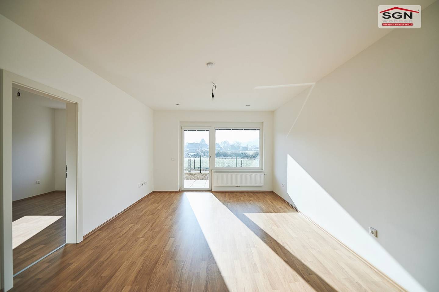 Geförderte 2 Zimmer- GARTENwohnung mit Tiefgaragenplatz