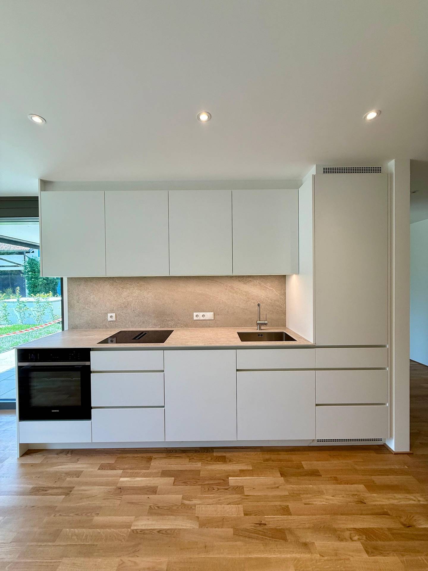 Bright ground floor apartment with private garden