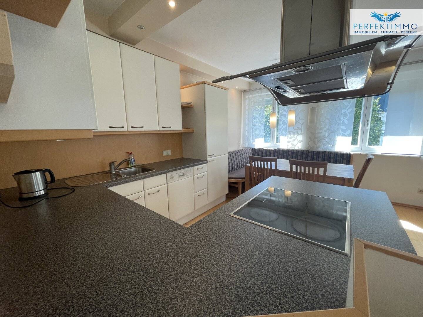 Charming 2-room apartment with terrace and covered parking space