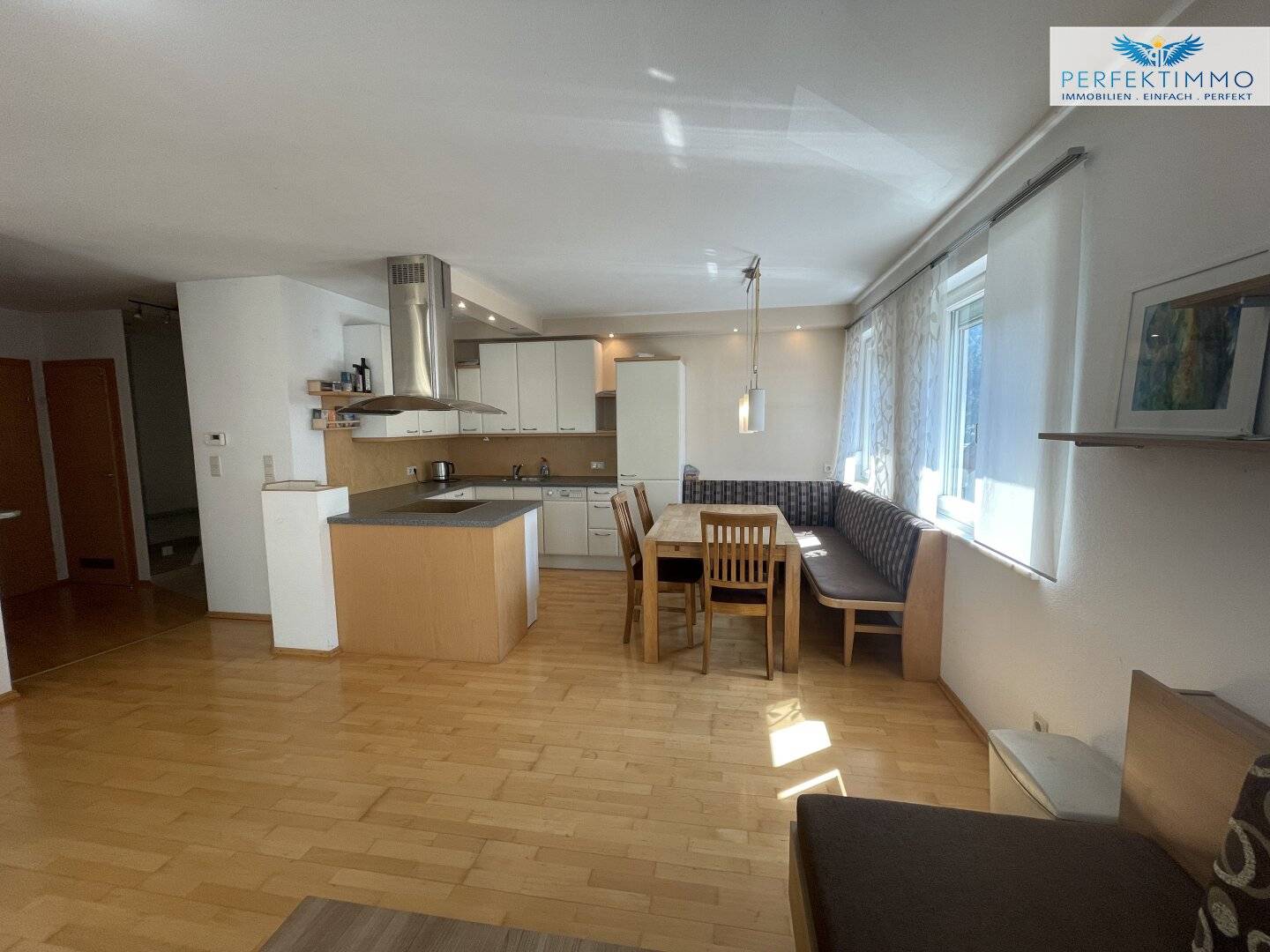 Charming 2-room apartment with terrace and covered parking space