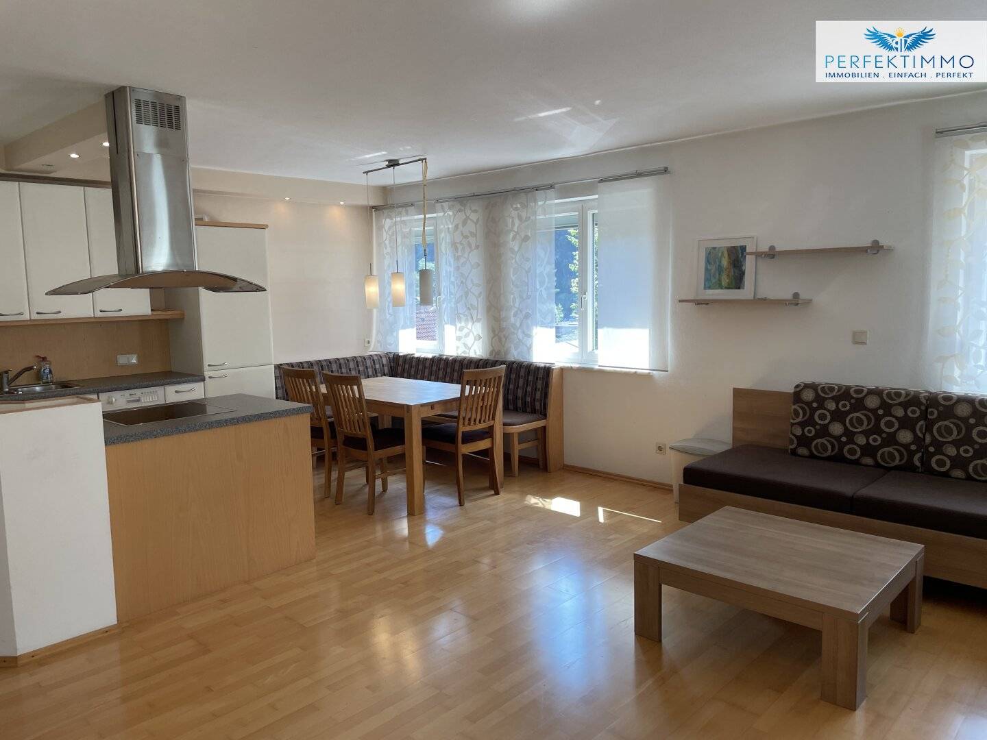 Charming 2-room apartment with terrace and covered parking space